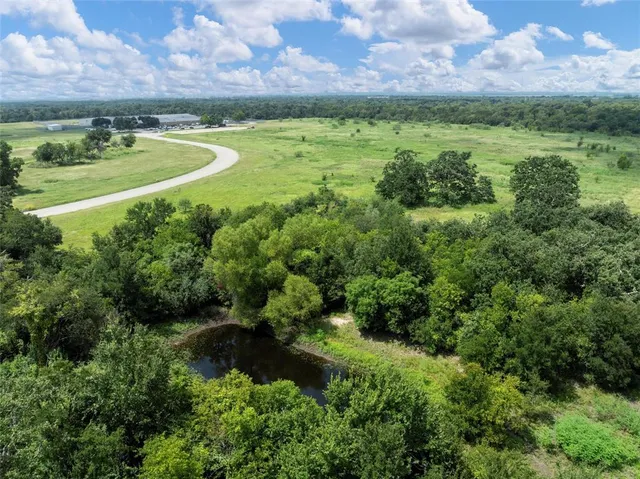 a view of a lush green field