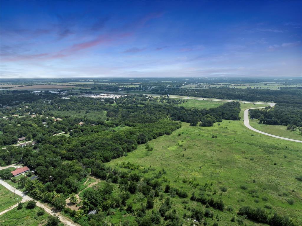 Tbd Phillip Street Marlin, TX 76661 - Photo 10 of 18 a view of a city with lush green forest