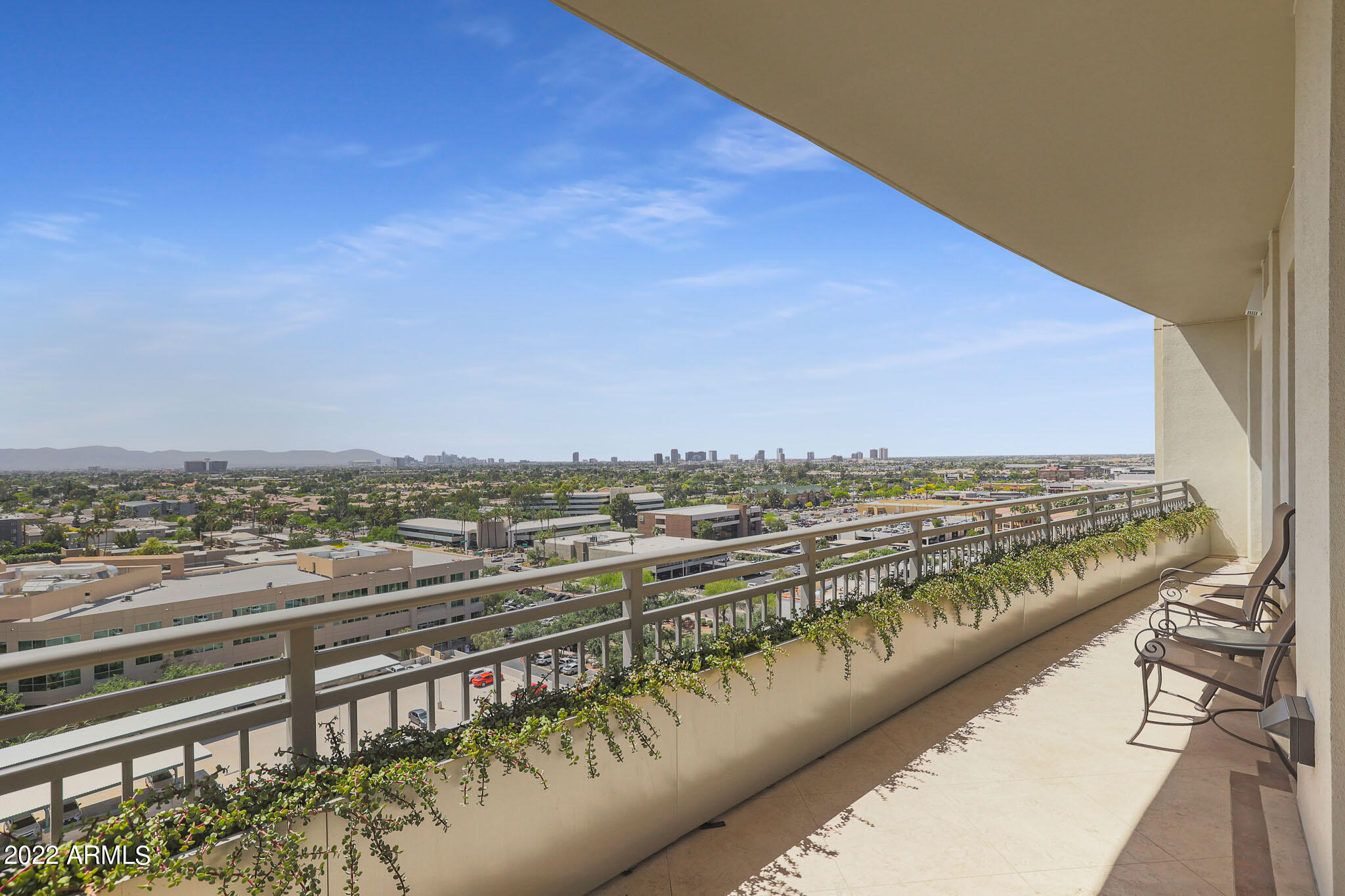2211 East Camelback Road, Unit 1105/06 Phoenix, AZ 85016 - Photo 59 of 69 a view of a city skyline from a terrace