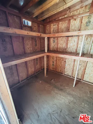 a view of a yard covered in snow