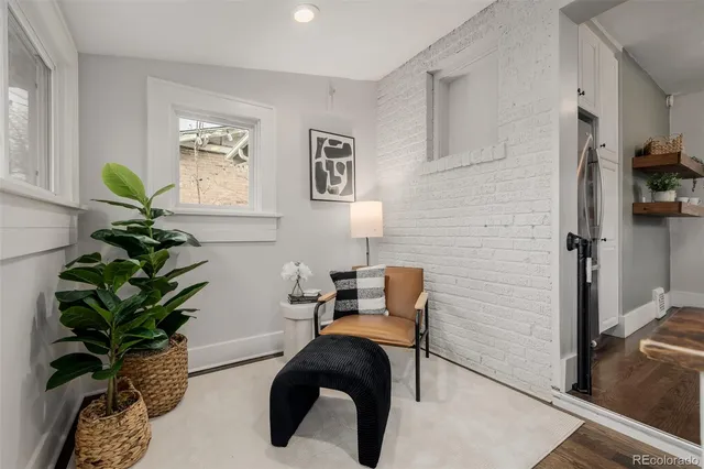 a potted plant sitting on top of a wooden floor