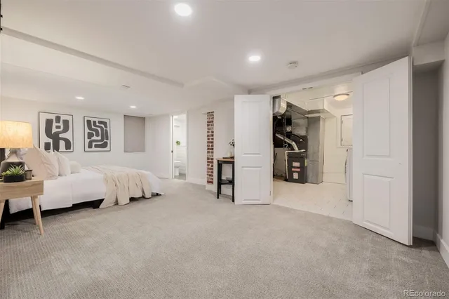 a bed room with a bed and a walk in closet