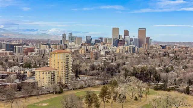 a view of a city with tall buildings