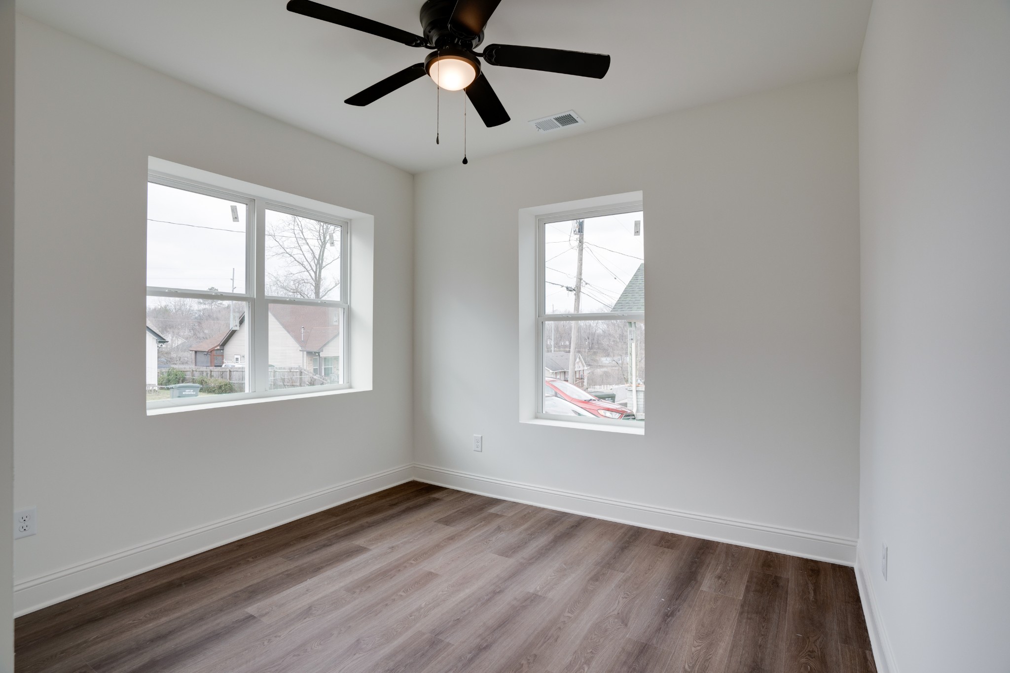 514 Smith Street Springfield, TN 37172 - Photo 14 of 25 a view of an empty room with wooden floor and a window