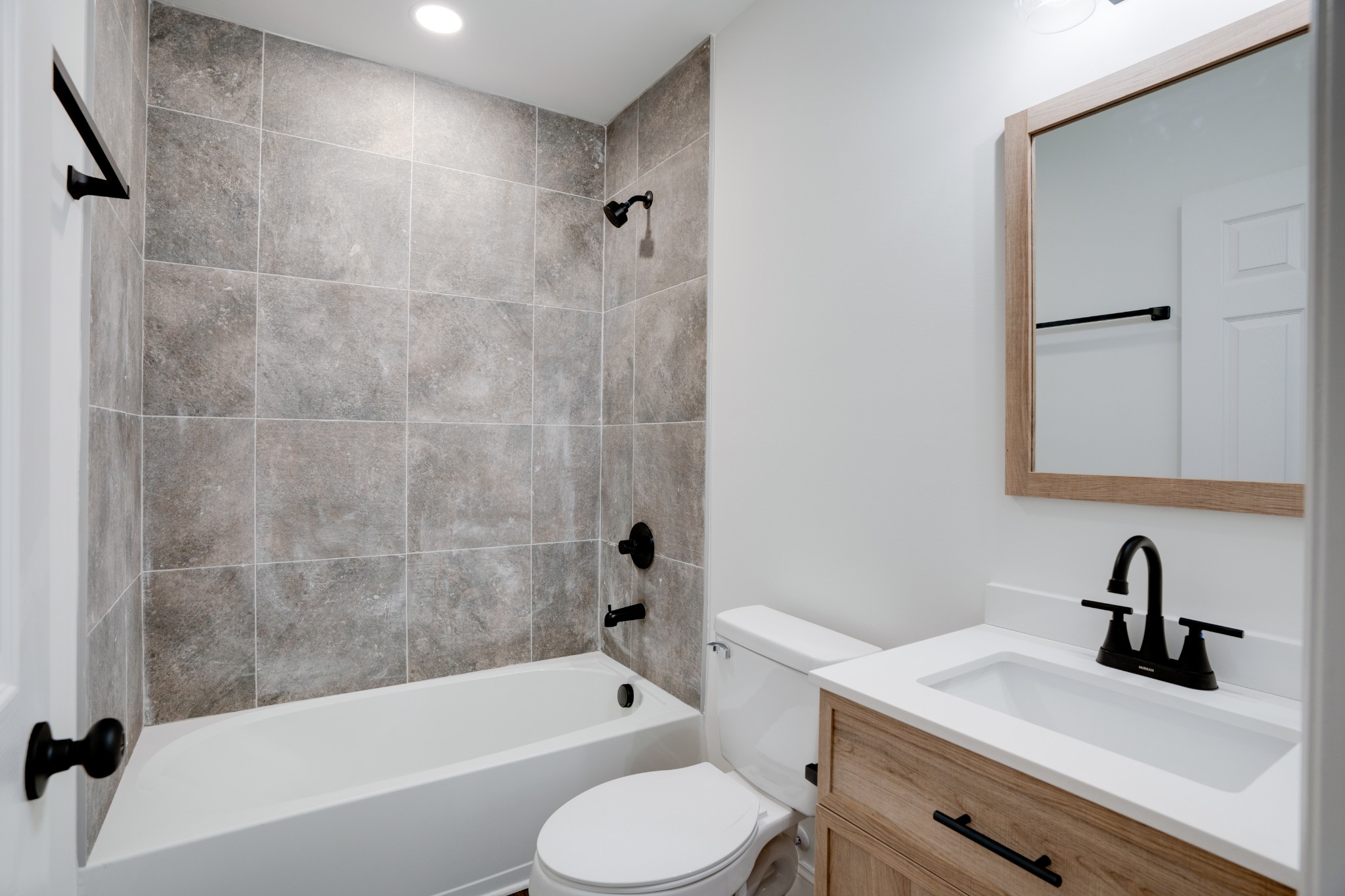 514 Smith Street Springfield, TN 37172 - Photo 23 of 25 a bathroom with a bathtub shower sink vanity mirror and toilet