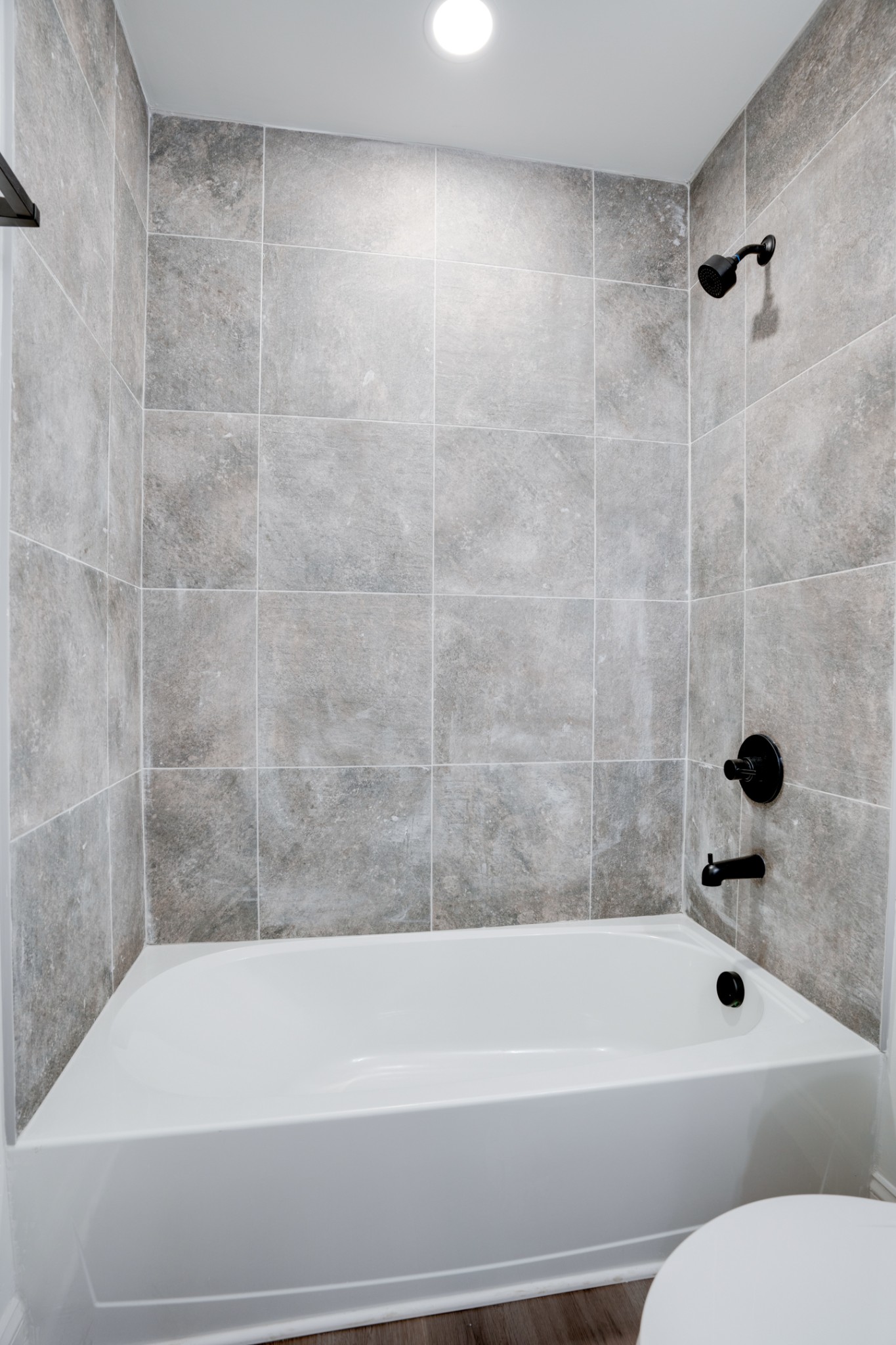 514 Smith Street Springfield, TN 37172 - Photo 25 of 25 a bathroom with a bathtub and a toilet