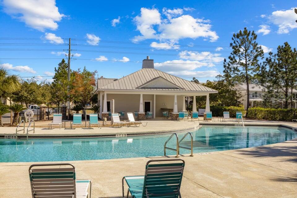45 North Sand Palm Road Freeport, FL 32439 - Photo 23 of 32 a view of a house with a yard patio and swimming pool