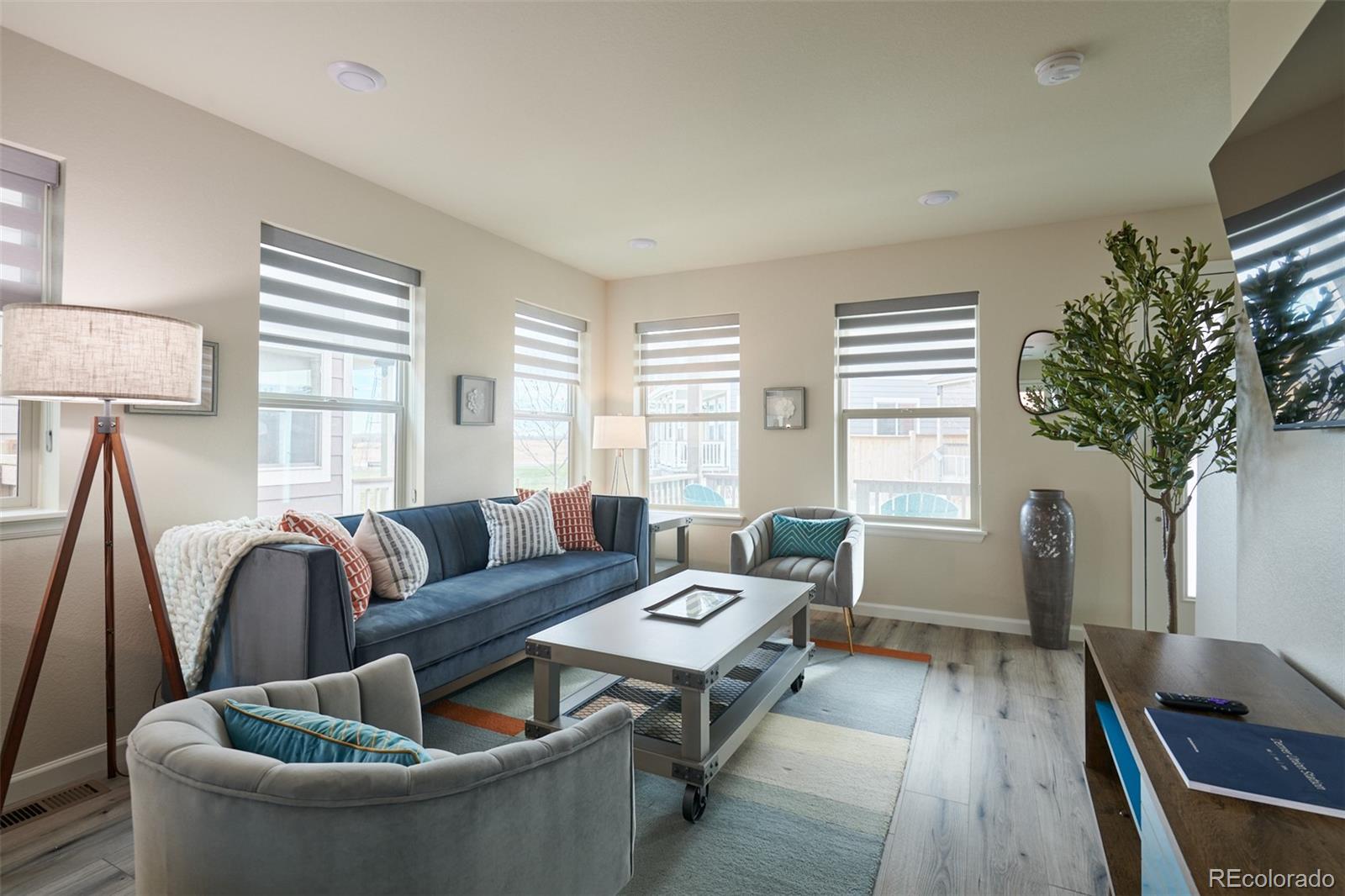 6339 North Hanover Street Denver, CO 80238 - Photo 12 of 24 a living room with furniture and a large window