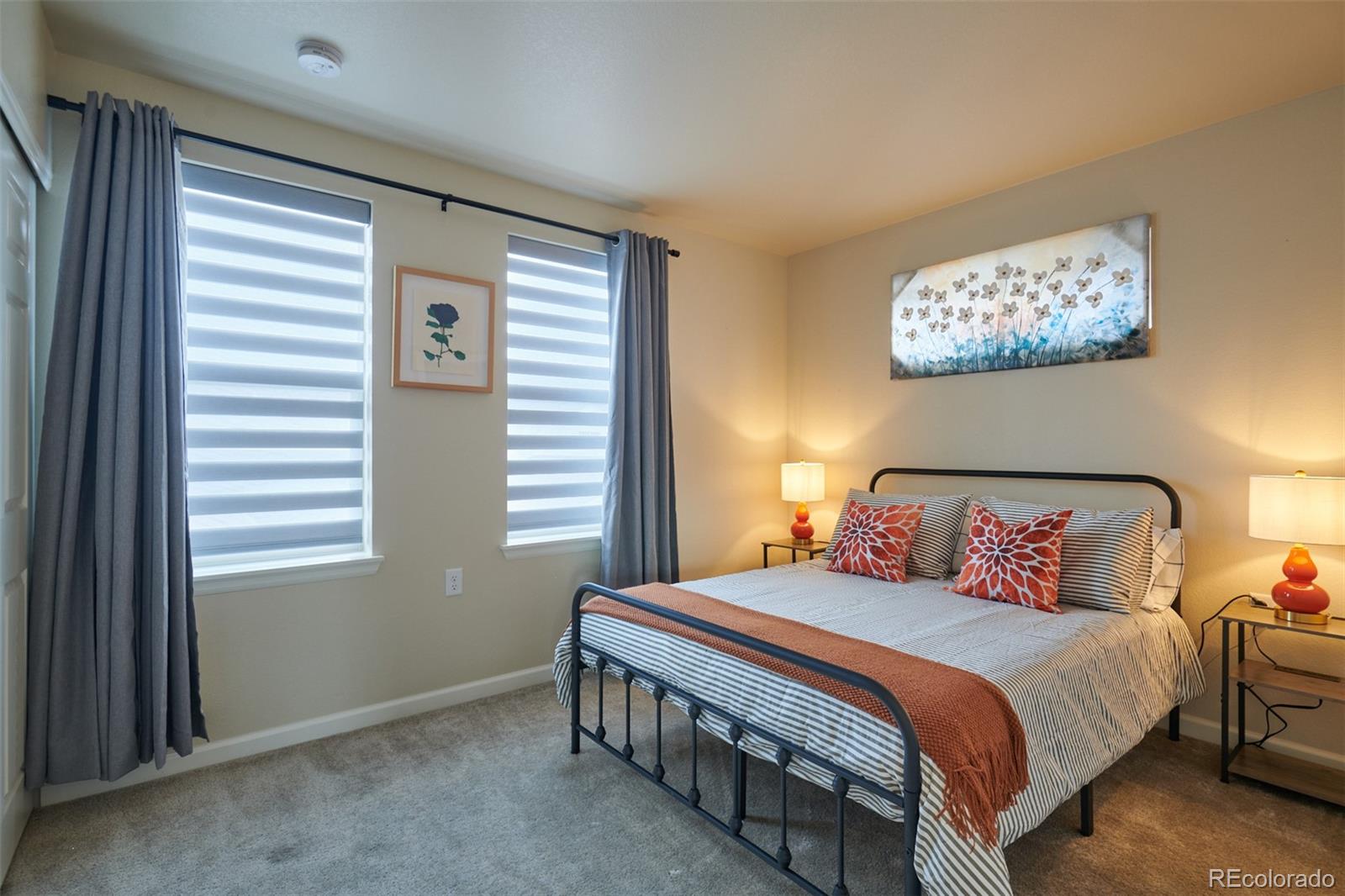 6339 North Hanover Street Denver, CO 80238 - Photo 19 of 24 a bedroom with bed and a window