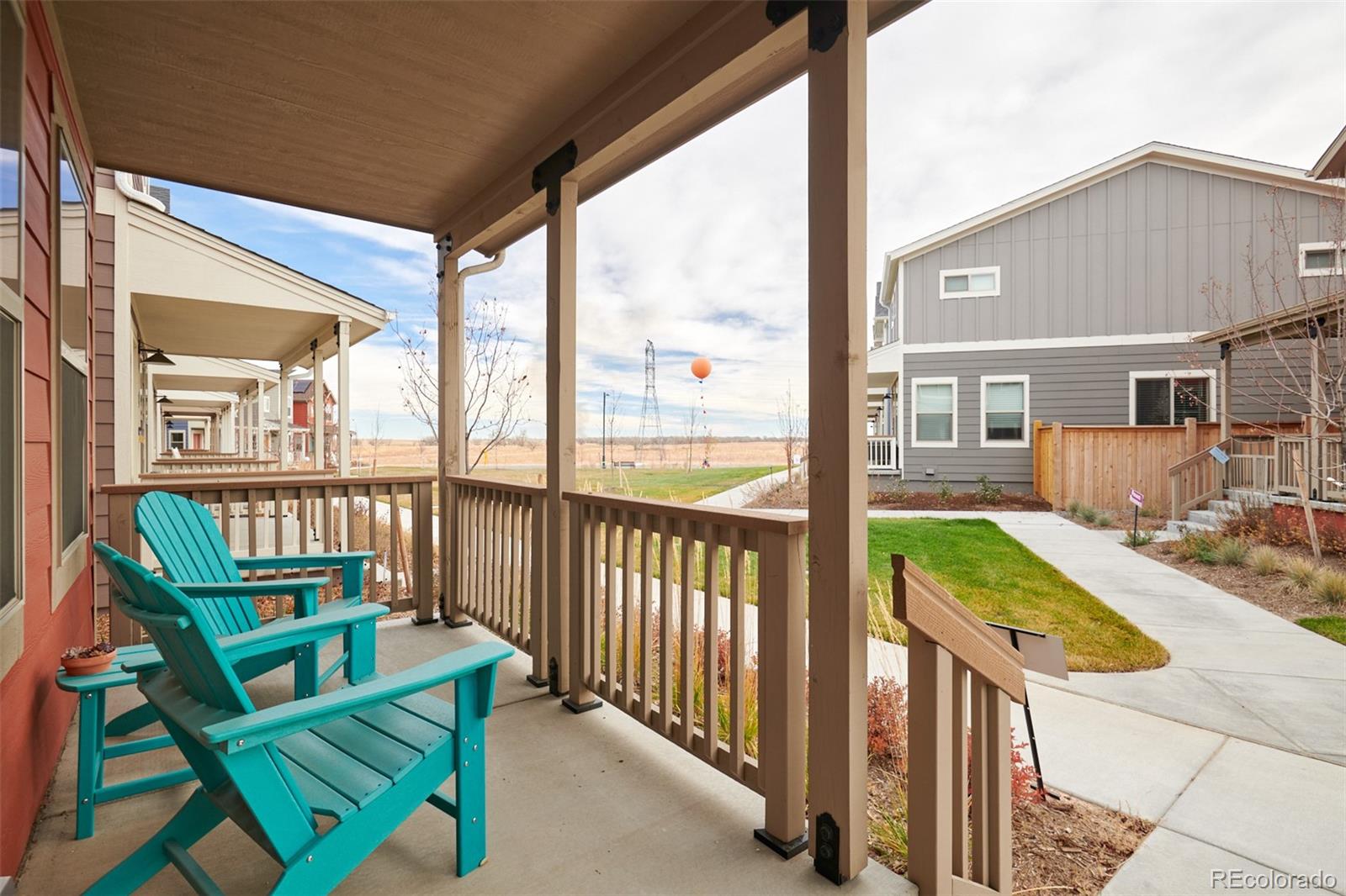 6339 North Hanover Street Denver, CO 80238 - Photo 24 of 24 a view of porch with a bench next to a yard