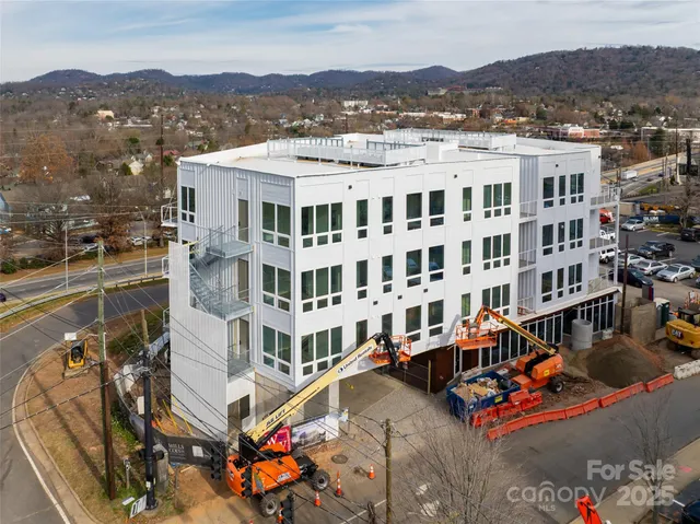 a view of a city with tall buildings