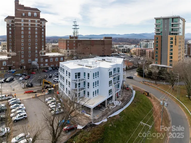 a view of a building with a city view