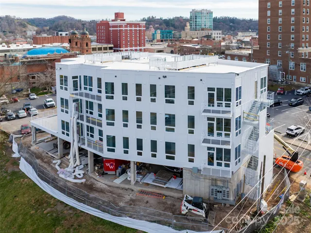 a view of a city with tall buildings