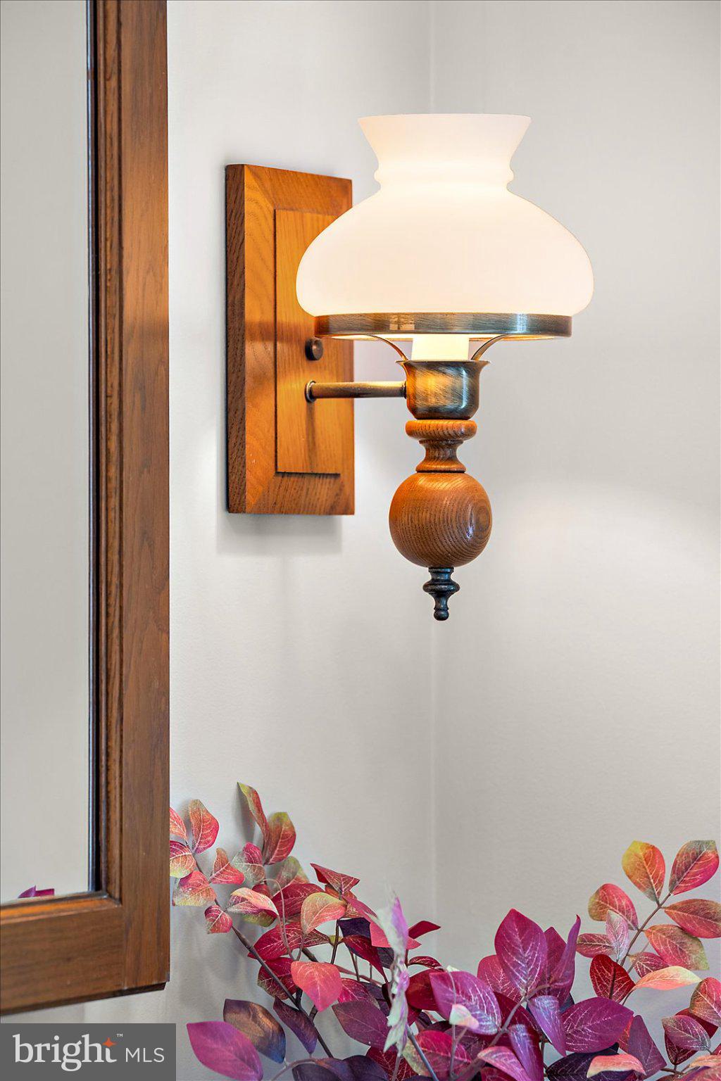 33915 Shockley Road Parsonsburg, MD 21849 - Photo 92 of 125 Elegant wall sconce with floral accents.