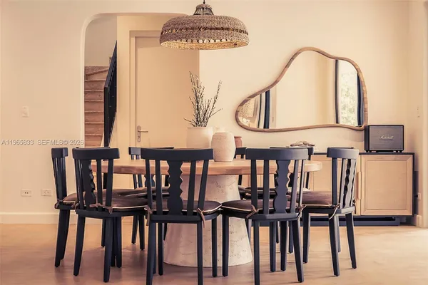 a view of a chairs and table in a kitchen