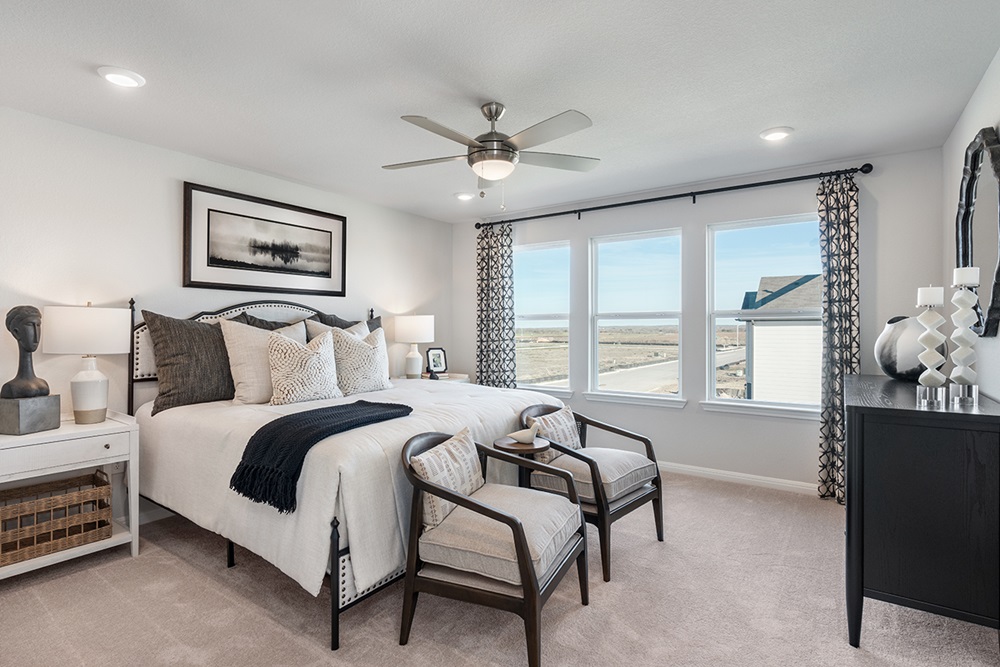 5901 Beverly Pr Road Del Valle, TX 78617 - Photo 13 of 18 a spacious bedroom with a bed and a window