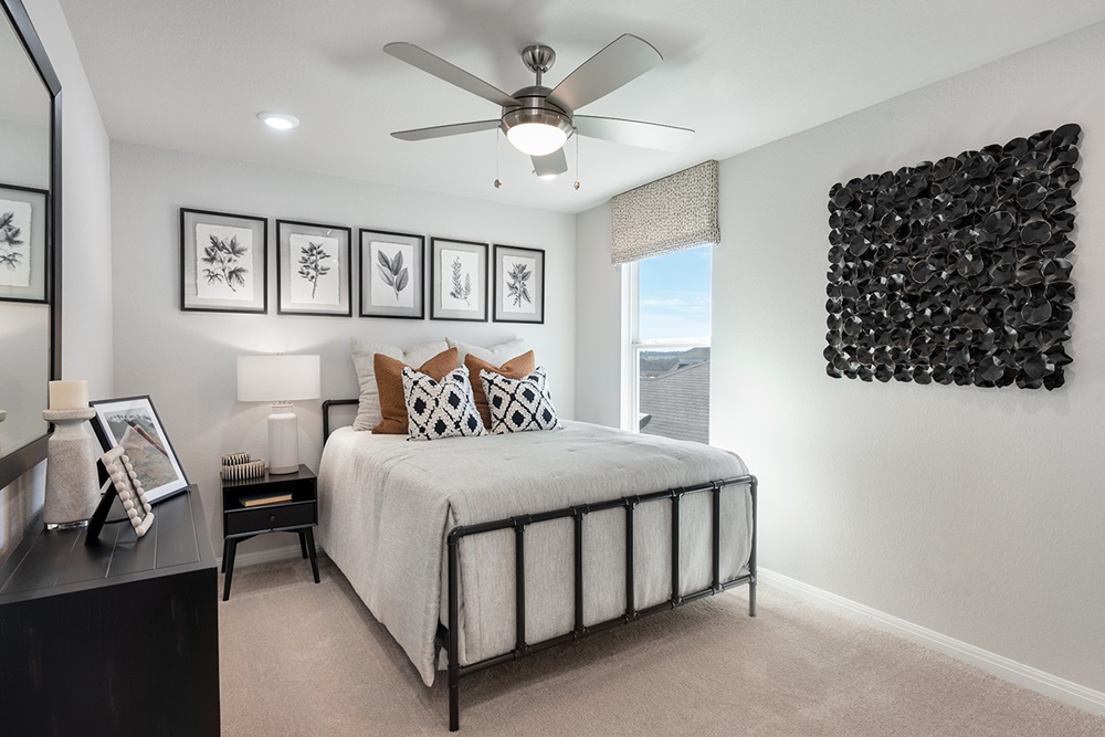 5901 Beverly Pr Road Del Valle, TX 78617 - Photo 4 of 18 a bedroom with a bed window and a wall painting