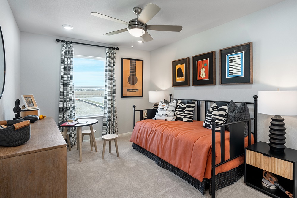 5901 Beverly Pr Road Del Valle, TX 78617 - Photo 5 of 18 a bedroom with a bed and wooden floor