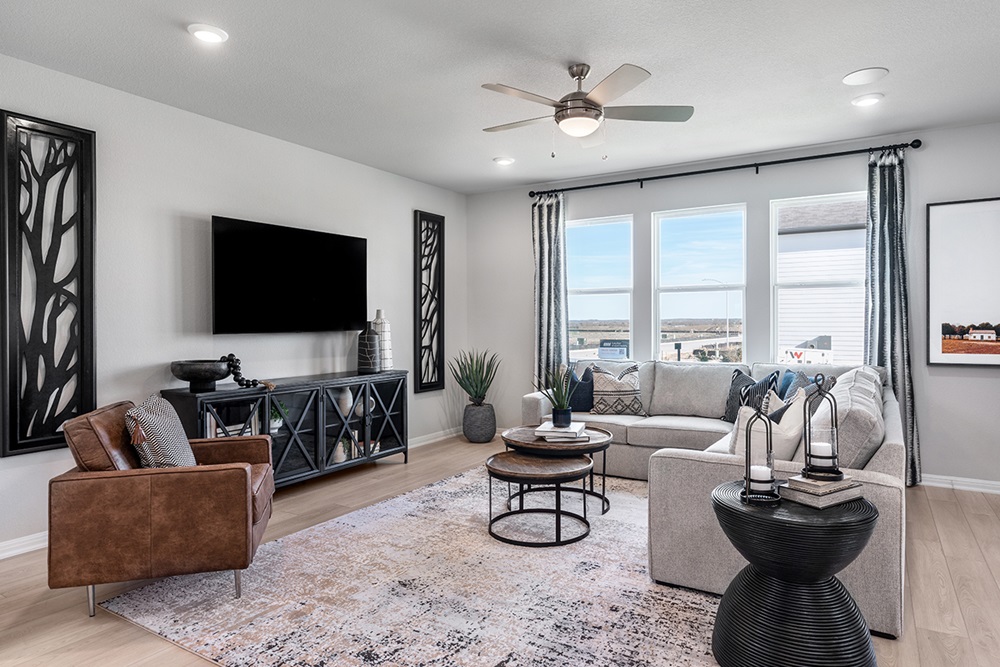 5901 Beverly Pr Road Del Valle, TX 78617 - Photo 8 of 18 a living room with furniture and a flat screen tv