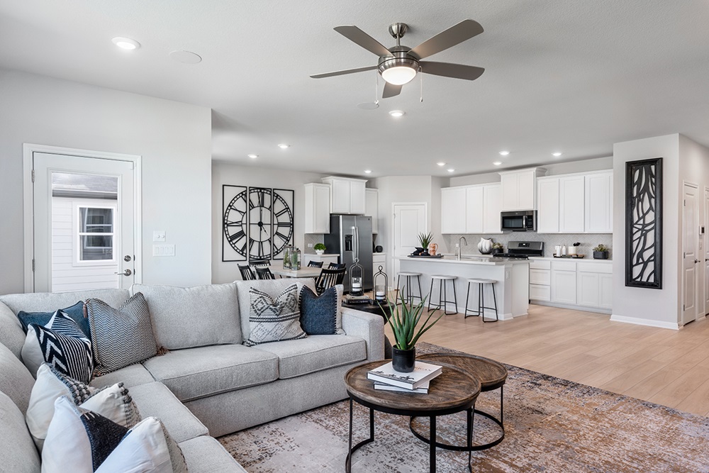 5901 Beverly Pr Road Del Valle, TX 78617 - Photo 9 of 18 a living room with furniture kitchen view and a potted plant
