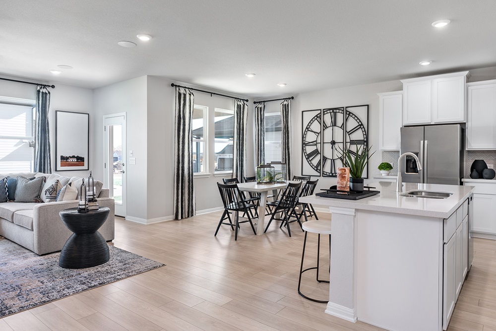 5901 Beverly Pr Road Del Valle, TX 78617 - Photo 10 of 18 a living room with furniture a large window and wooden floor