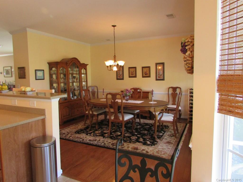 769 Platinum Drive Fort Mill, SC 29708 - Photo 11 of 19 a view of a dining room and chairs and table in a kitchen