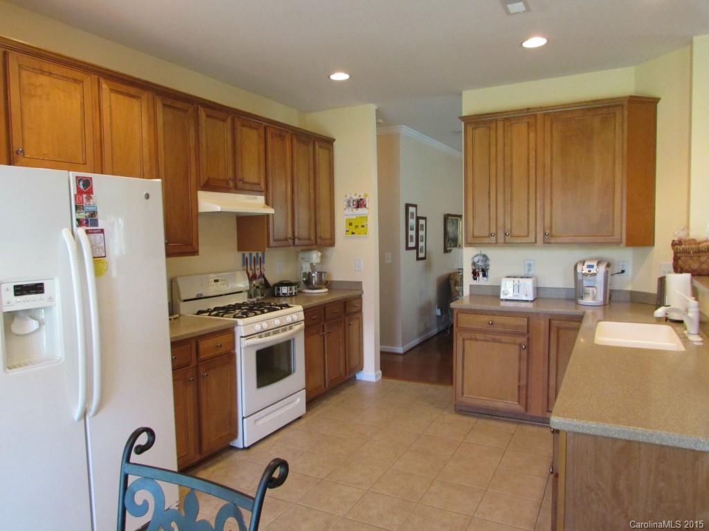 769 Platinum Drive Fort Mill, SC 29708 - Photo 12 of 19 a kitchen with a refrigerator stove and sink