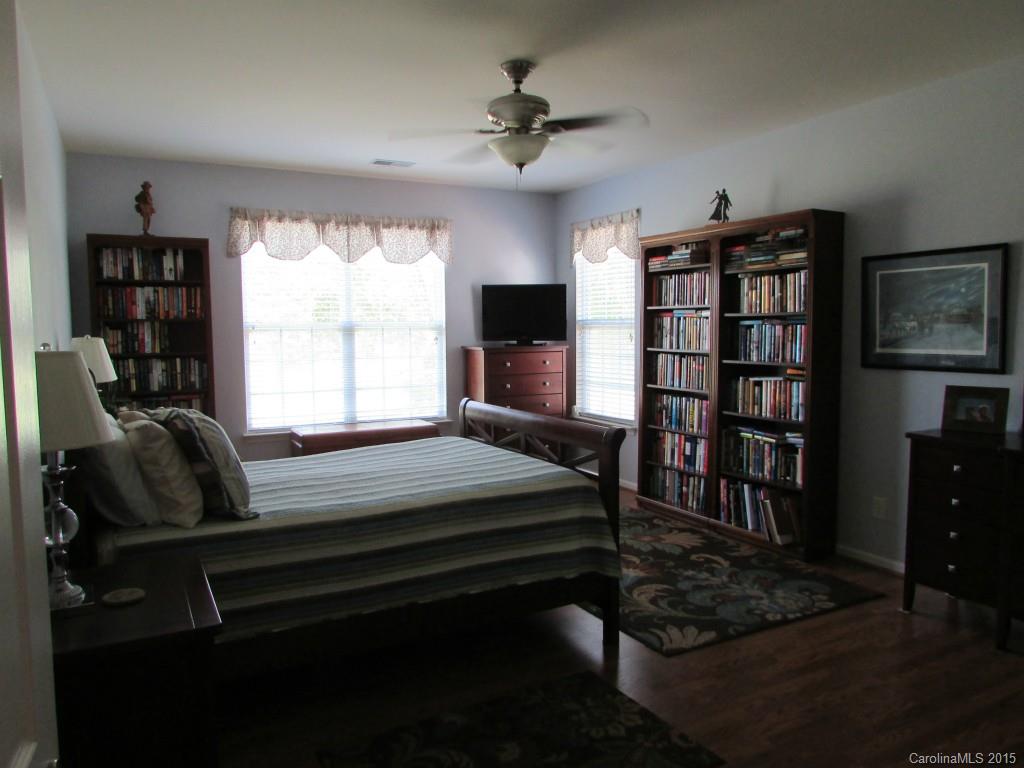 769 Platinum Drive Fort Mill, SC 29708 - Photo 16 of 19 a bedroom with furniture window and book shelfs