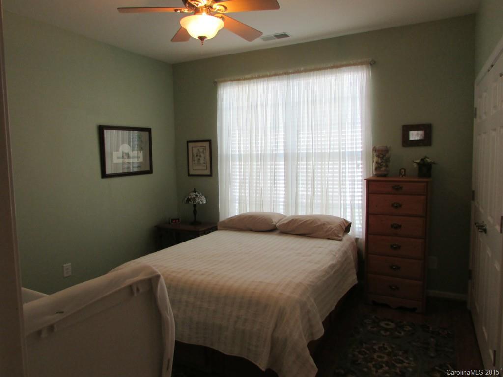 769 Platinum Drive Fort Mill, SC 29708 - Photo 7 of 19 a bedroom with a bed and a window