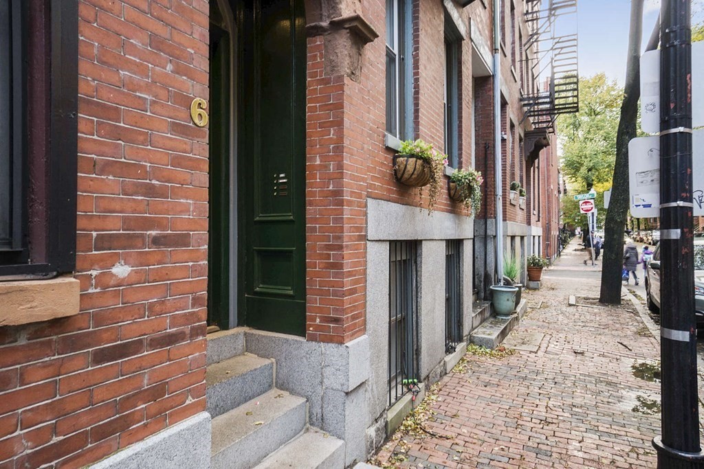 6 Dwight Street, Unit 1 Boston, MA 02118 - Photo 20 of 20 a front view of a house with a yard