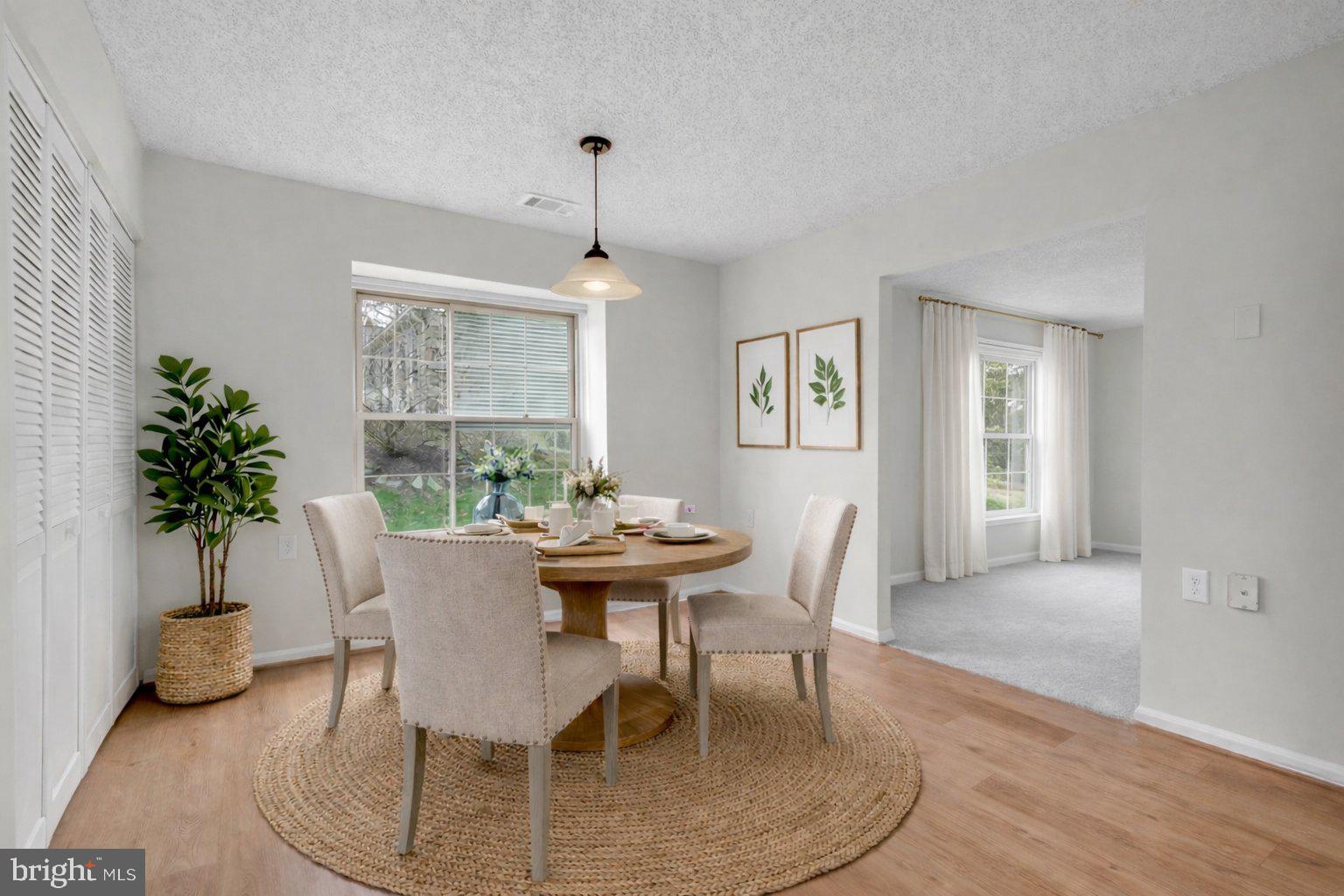 2572 Golfers Ridge Road Annapolis, MD 21401 - Photo 23 of 69 a view of a dining room with furniture and window