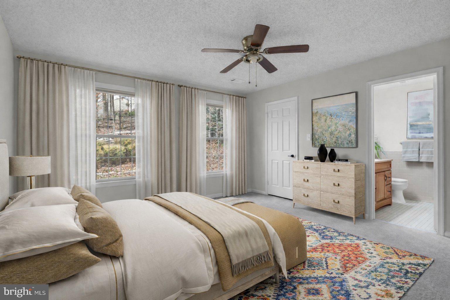 2572 Golfers Ridge Road Annapolis, MD 21401 - Photo 35 of 69 a bedroom with a large bed and a window