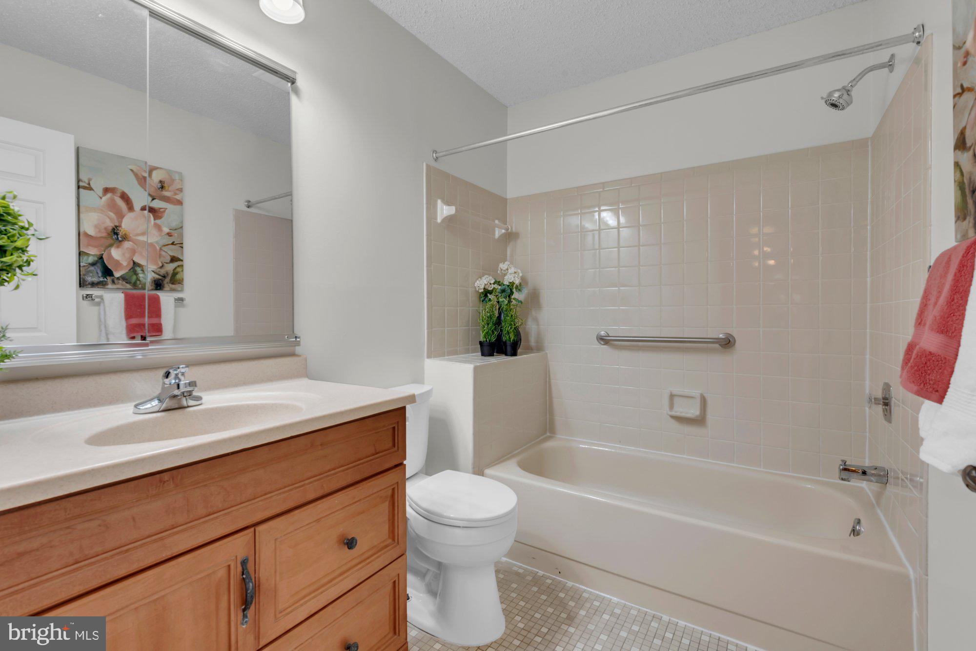 2572 Golfers Ridge Road Annapolis, MD 21401 - Photo 41 of 69 a bathroom with a sink a toilet and a bathtub