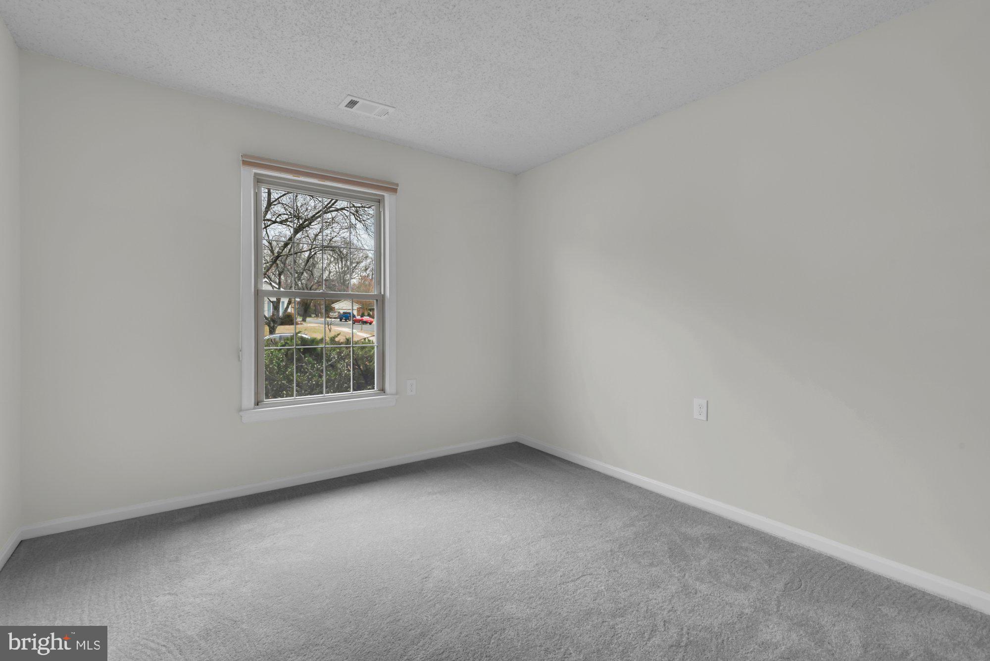 2572 Golfers Ridge Road Annapolis, MD 21401 - Photo 44 of 69 an empty room with a window