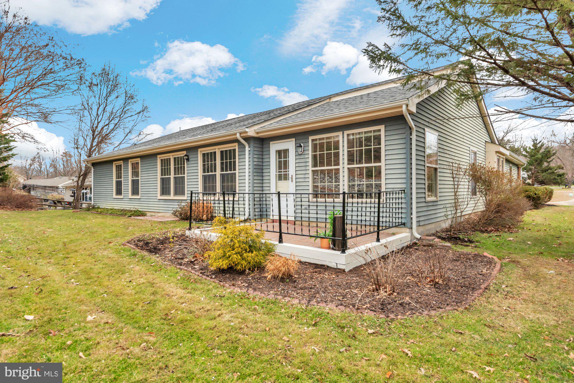 2572 Golfers Ridge Road Annapolis, MD 21401 - Photo 50 of 69 a view of a house with backyard and sitting area