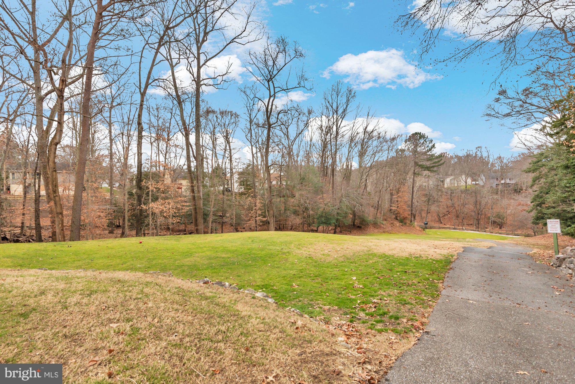 2572 Golfers Ridge Road Annapolis, MD 21401 - Photo 54 of 69 a view of a yard with an trees