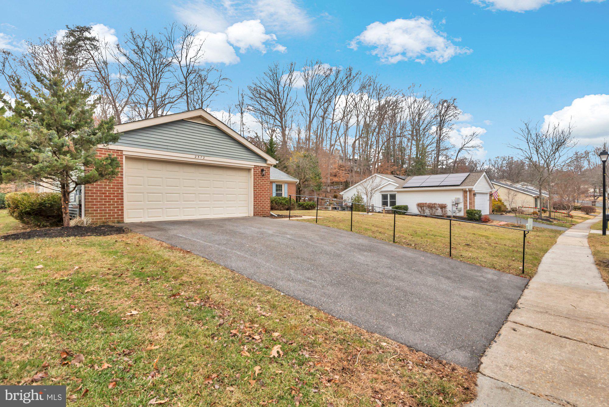 2572 Golfers Ridge Road Annapolis, MD 21401 - Photo 64 of 69 a view of a house with a yard