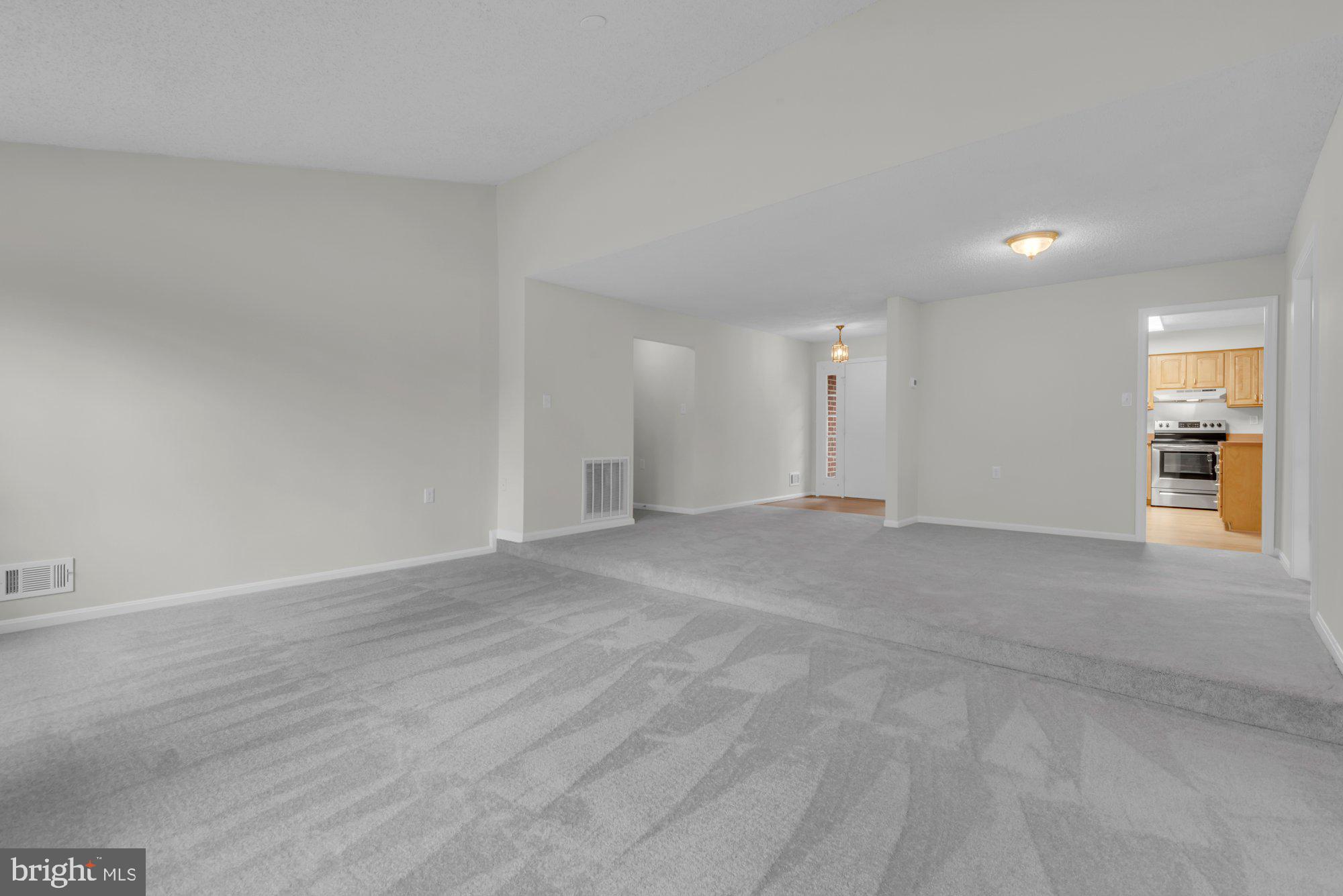 2572 Golfers Ridge Road Annapolis, MD 21401 - Photo 9 of 69 a view of a big room with a kitchen