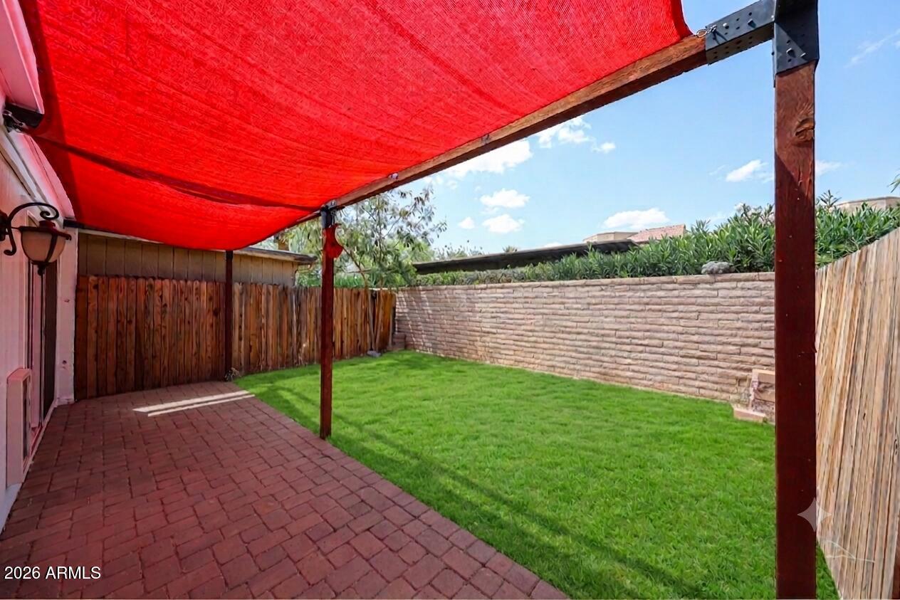 5114 East Monte Vista Road Phoenix, AZ 85008 - Photo 2 of 45 a view of a backyard with a garden
