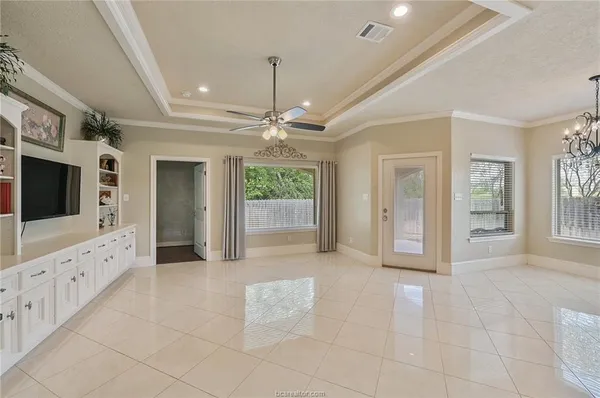 a view of an entryway with chandelier