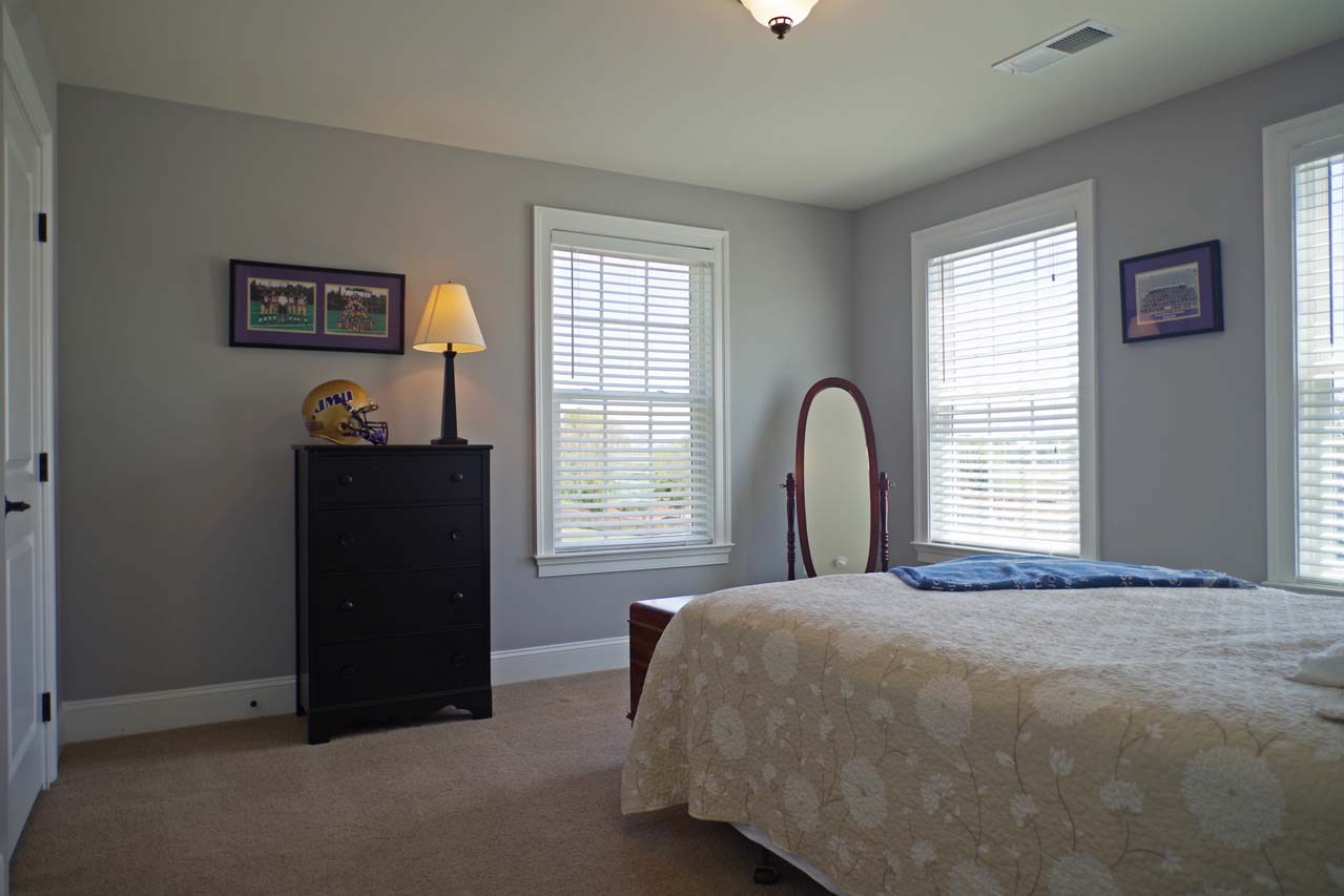 184 Ridgemont Road Ruckersville, VA 22968 - Photo 36 of 50 a bedroom with a bed and a window
