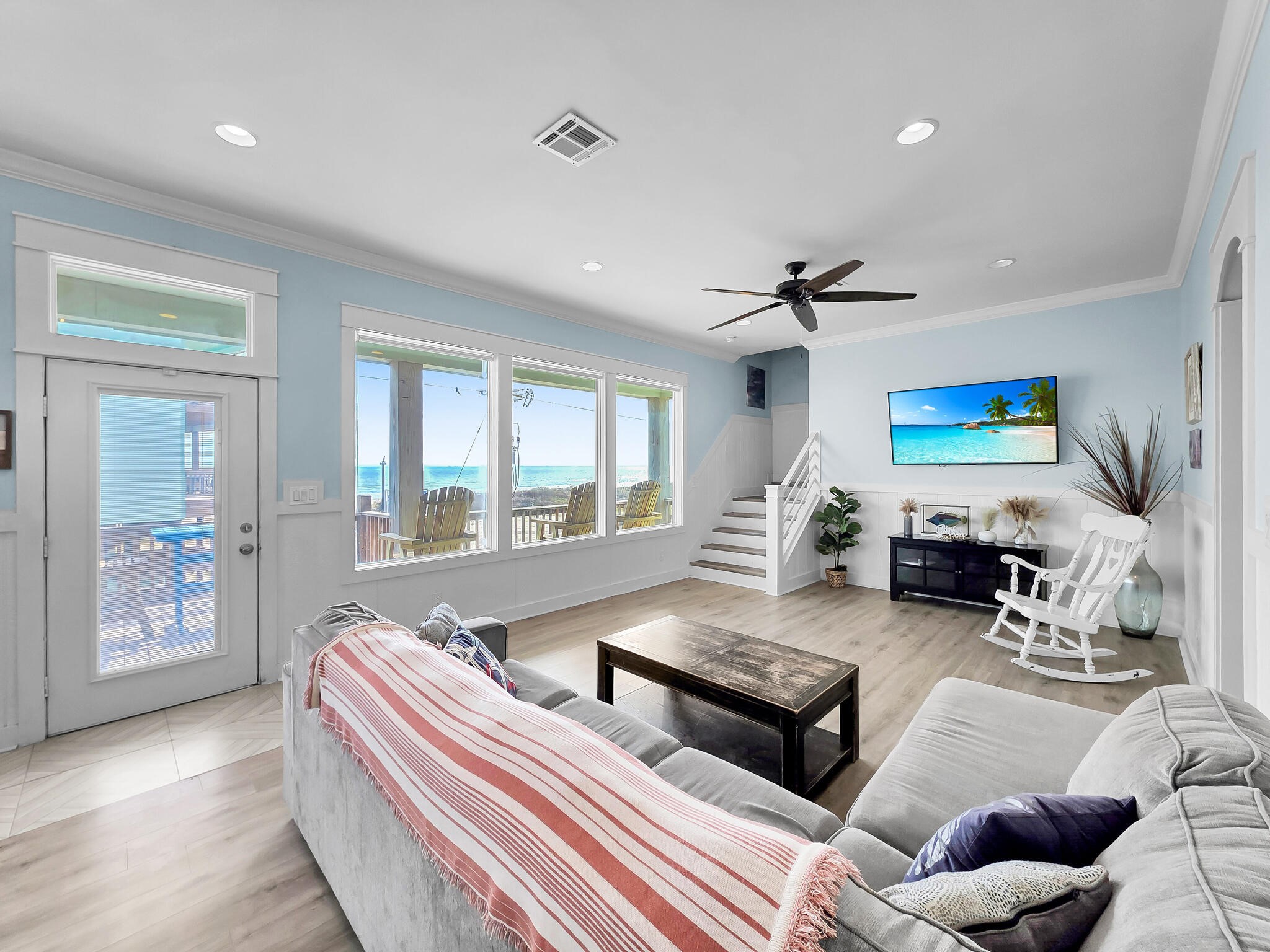 816 South Crystal Beach Road Crystal Beach, TX 77650 - Photo 12 of 48 a living room with furniture and a large window
