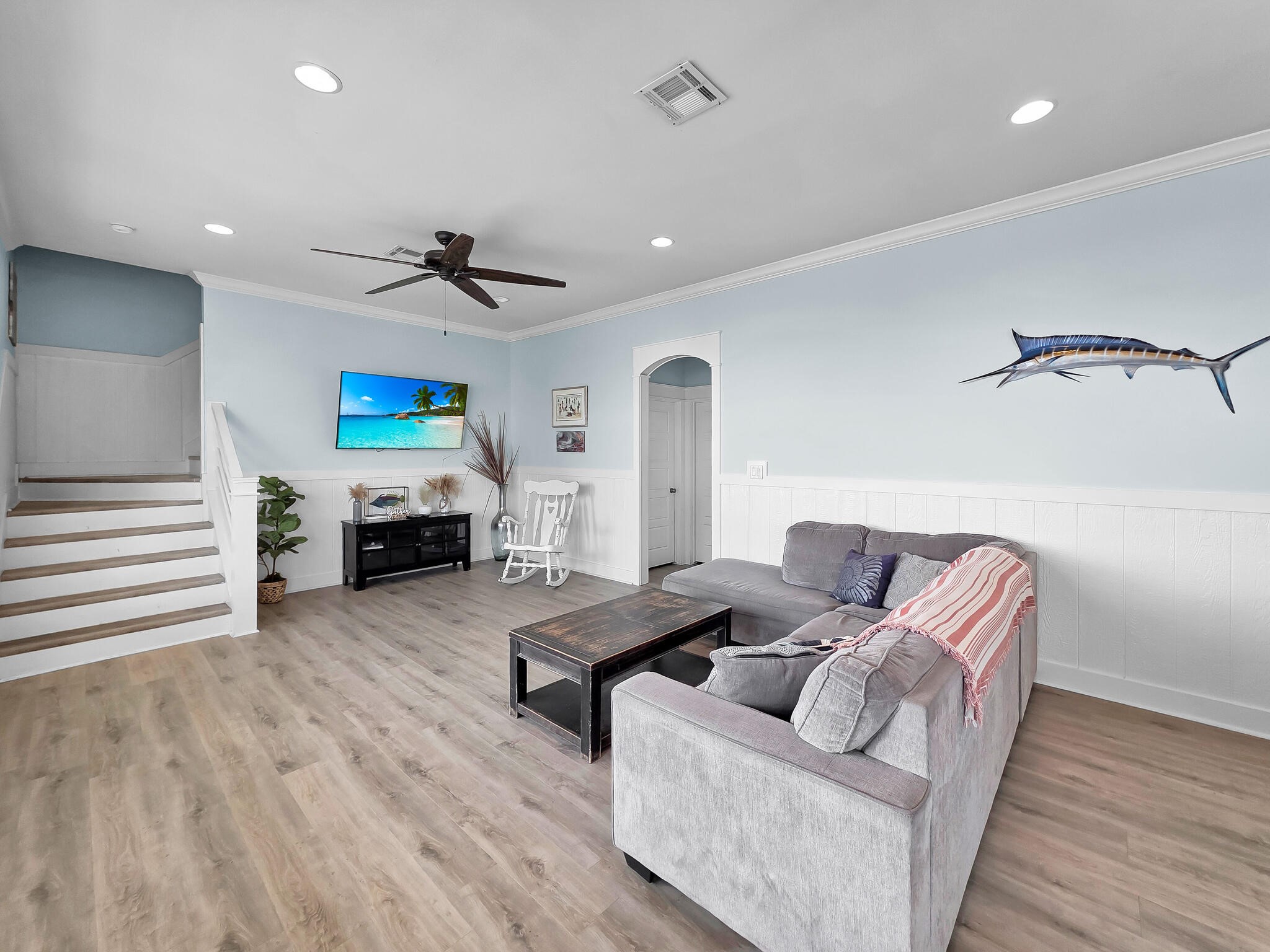 816 South Crystal Beach Road Crystal Beach, TX 77650 - Photo 13 of 48 a living room with furniture and a wooden floor