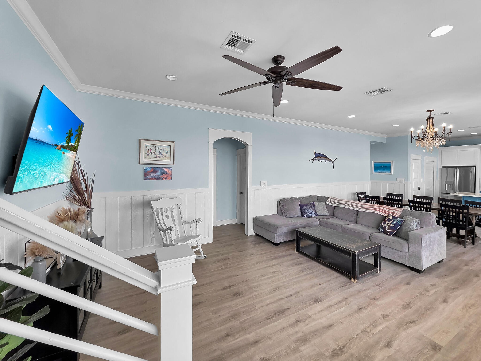 816 South Crystal Beach Road Crystal Beach, TX 77650 - Photo 14 of 48 a living room with furniture and a flat screen tv