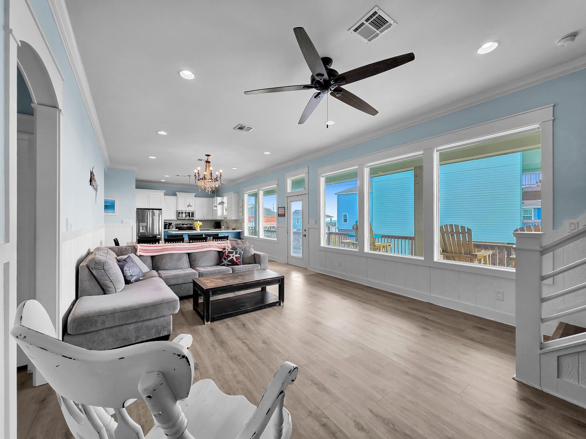 816 South Crystal Beach Road Crystal Beach, TX 77650 - Photo 15 of 48 a living room with furniture and a large window