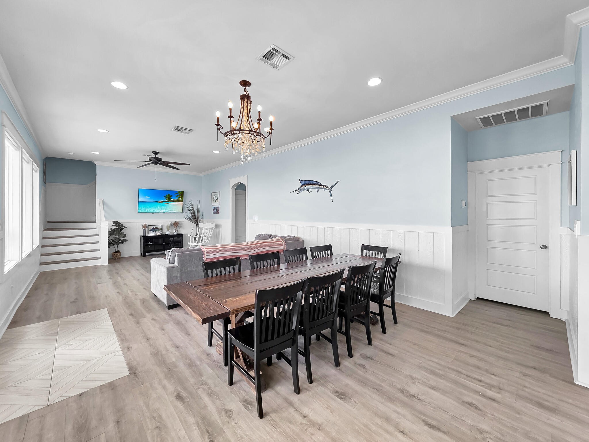 816 South Crystal Beach Road Crystal Beach, TX 77650 - Photo 19 of 48 a dining room with furniture and wooden floor