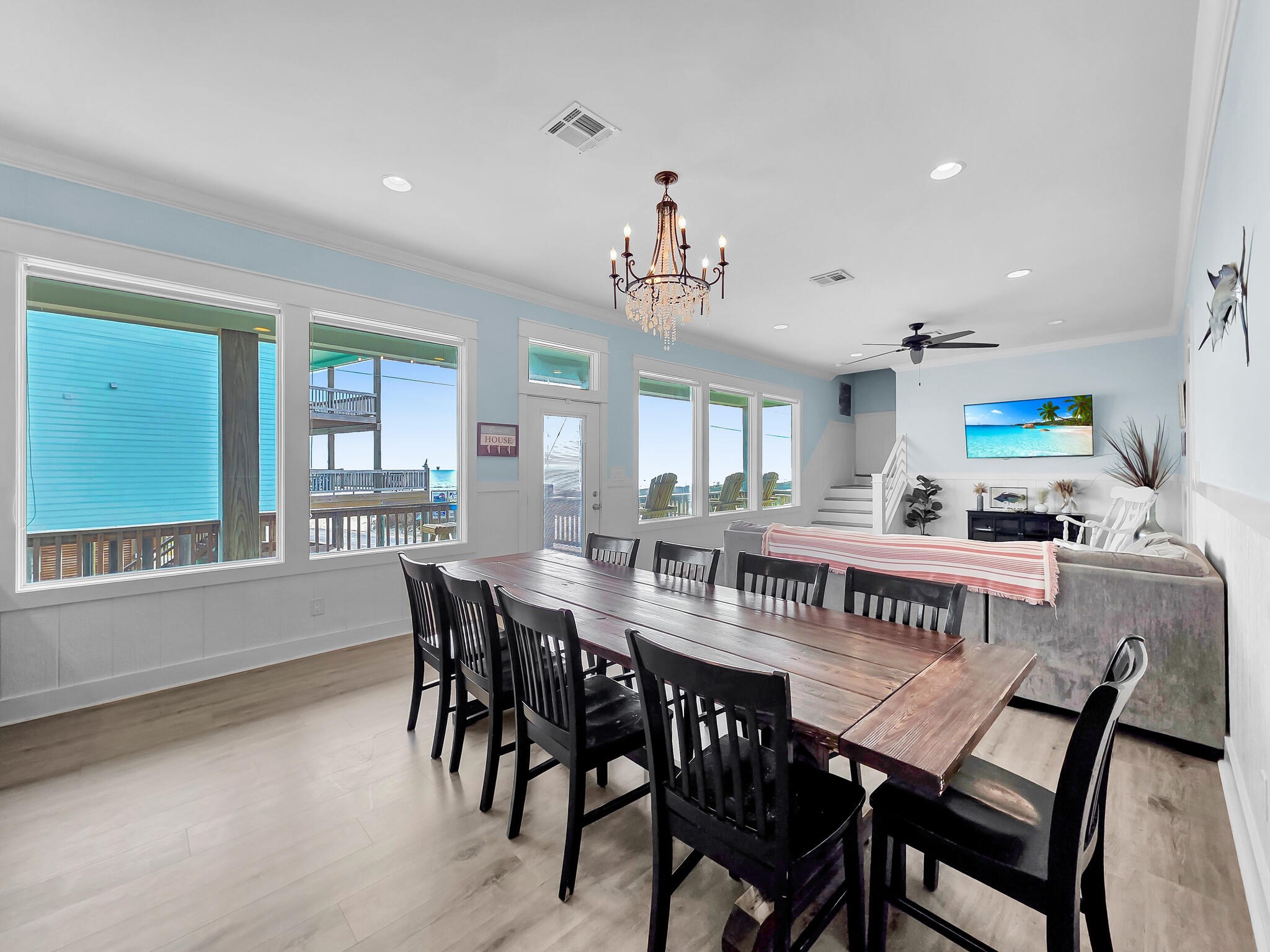 816 South Crystal Beach Road Crystal Beach, TX 77650 - Photo 20 of 48 a view of a dining room with furniture and window