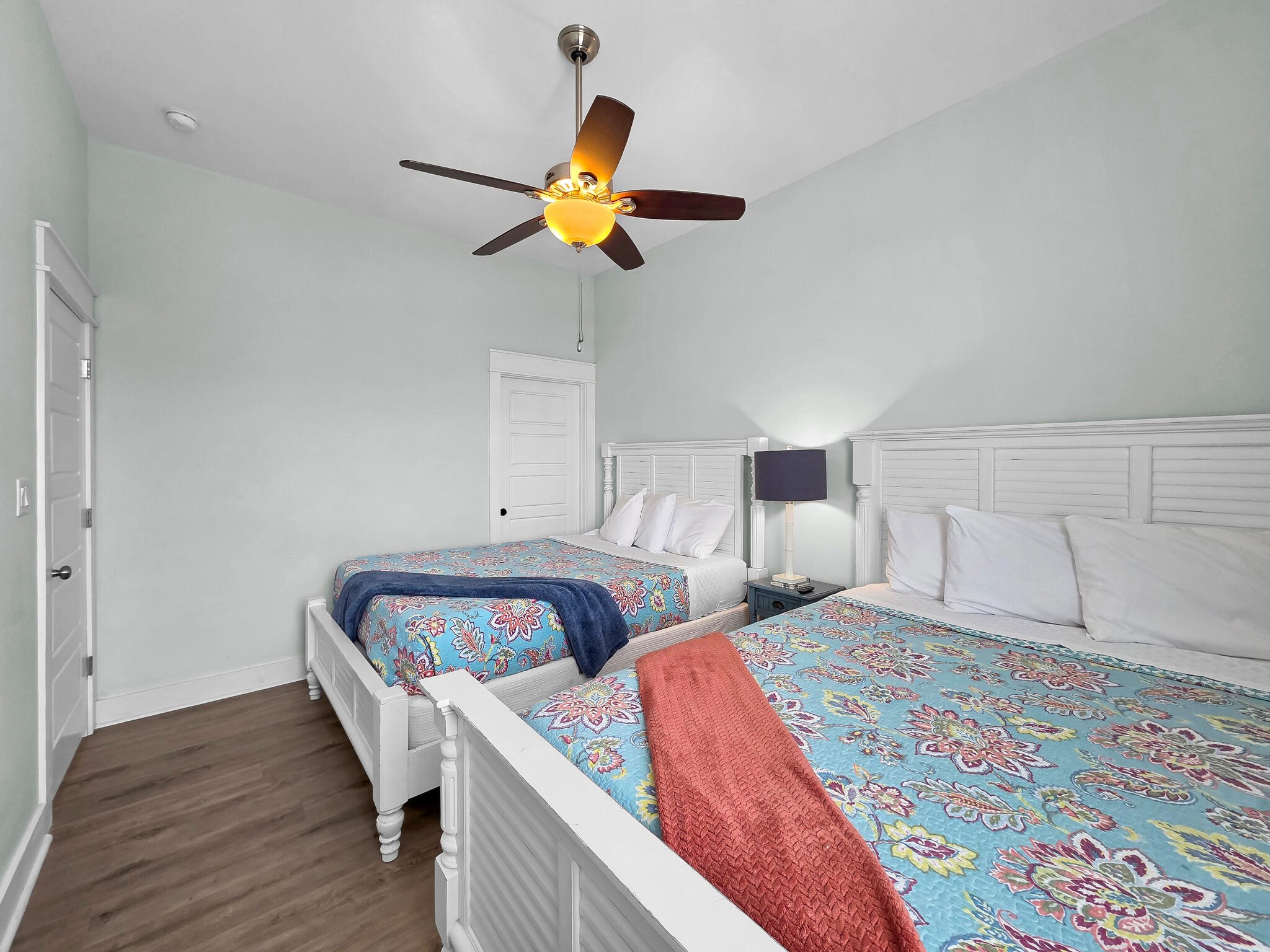 816 South Crystal Beach Road Crystal Beach, TX 77650 - Photo 25 of 48 a bedroom with two beds and painting on the wall