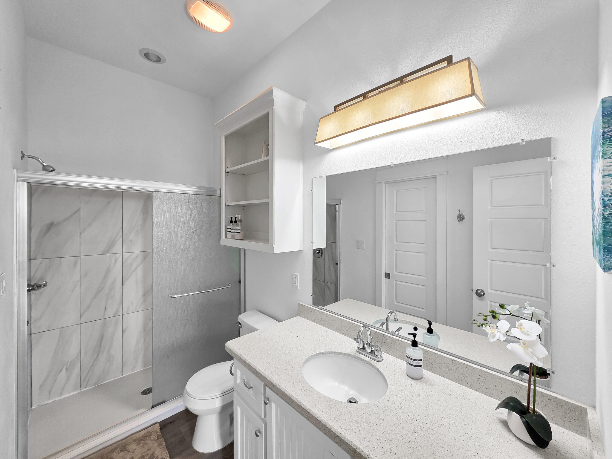 816 South Crystal Beach Road Crystal Beach, TX 77650 - Photo 27 of 48 a bathroom with a sink a toilet and shower