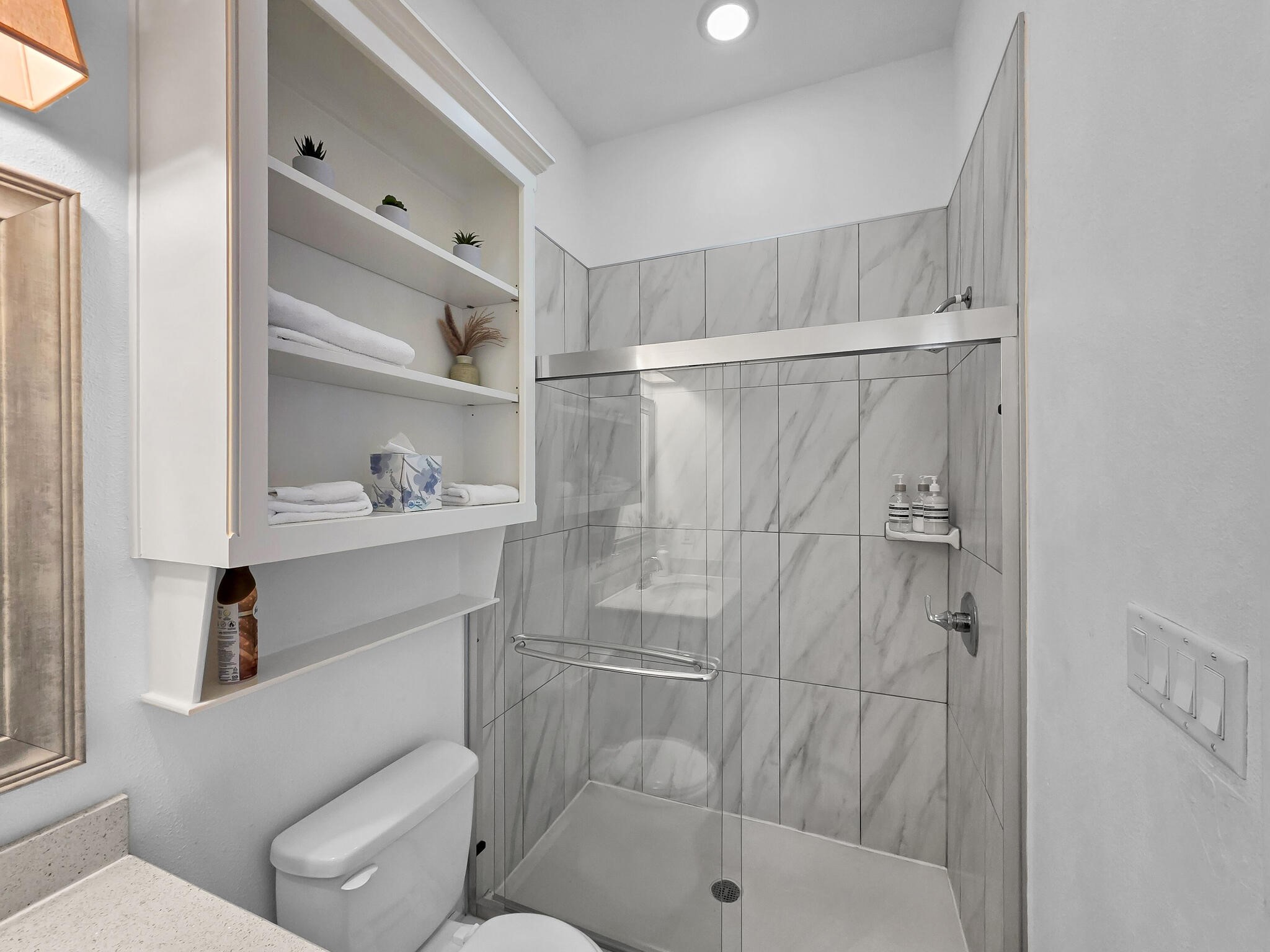 816 South Crystal Beach Road Crystal Beach, TX 77650 - Photo 31 of 48 a bathroom with a toilet and a shower